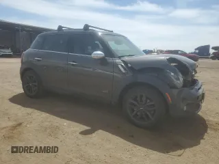 2013 MINI Countryman S ALL4 z VIN WMWZC5C56DWM16203, wystawiony jako Copart lot #54346425 z przebiegiem 148 065 mil mil oraz Szkoda całkowita • Salvage title. Historia ofert i sprzedaży dostępna na DreamBid. Obrazek 4.