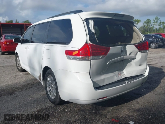 2012 Toyota Sienna XLE AAS with VIN 5TDYK3DC4CS186081, listed as a IAAI auction lot 42481131 with 187,849 mi miles and . Bid and sale history available at DreamBid. Image 3.