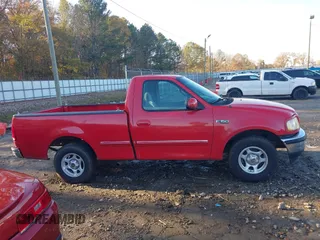 1997 Ford F-150 z VIN 1FTDF176XVNA86993, wystawiony jako IAAI lot #40938916 z przebiegiem 259 755 mil mil oraz . Historia ofert i sprzedaży dostępna na DreamBid. Obrazek 13.