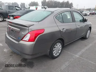 2015 Nissan Versa S Plus with VIN 3N1CN7AP9FL810597, listed as a IAAI auction lot 41681629 with 133,777 mi miles. Bid and sale history available at carsss.com. Image 4.