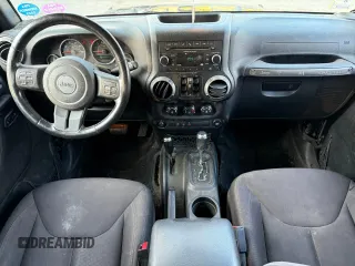 2015 Jeep Wrangler Unlimited Sport with VIN 1C4BJWDG8FL502570, listed as a Copart auction lot 65854505 with 120,541 mi miles and Clean title. Bid and sale history available at DreamBid. Image 9.