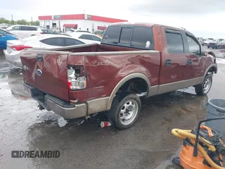 2005 Ford F-150 XLT with VIN 1FTPW14545KC40740, listed as a IAAI auction lot 41932653 with 164,641 mi miles. Bid and sale history available at carsss.com. Image 4.