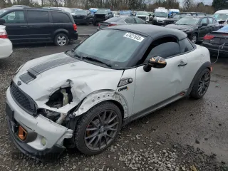 2012 MINI Coupe S z VIN WMWSX3C59CT465518, wystawiony jako Copart lot #47627845 z przebiegiem 105 388 mil mil oraz Szkody całkowita. Historia ofert i sprzedaży dostępna na DreamBid. Obrazek 1.
