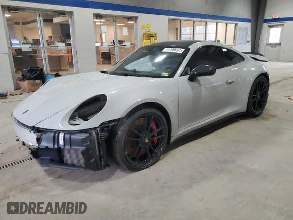2023 Porsche 911 Carrera S with VIN WP0AB2A92PS220410, listed as a Copart auction lot 85706084 with 14,460 mi miles and Salvage Title. Bid and sale history available at carsss.com. Image 1.