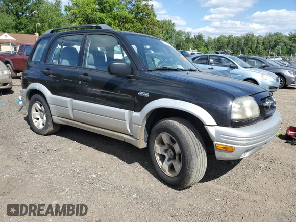 1999 Suzuki Grand Vitara z VIN JS3TD62VXX4100236, wystawiony jako Copart lot #57228075 z przebiegiem Nie podano mil oraz Szkody całkowita. Historia ofert i sprzedaży dostępna na DreamBid. Obrazek 4.
