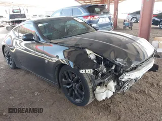 2015 Nissan 370Z Sport with VIN JN1AZ4EH3FM442775, listed as a IAAI auction lot 41960249 with 125,780 mi miles and . Bid and sale history available at DreamBid. Image 1.
