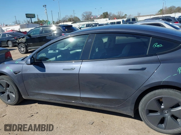 2022 Tesla Model 3 with VIN 5YJ3E1EAXNF326354, listed as a IAAI auction lot 41651872 with 27,922 mi miles and . Bid and sale history available at DreamBid. Image 15.