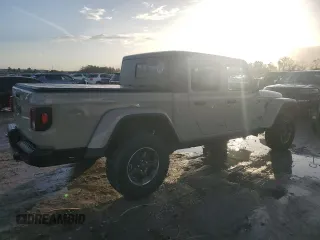 2022 Jeep Gladiator Rubicon z VIN 1C6JJTBG3NL174980, wystawiony jako Copart lot #85774884 z przebiegiem Nie podano mil oraz Nie do naprawy • Non repairable. Historia ofert i sprzedaży dostępna na DreamBid. Obrazek 3.
