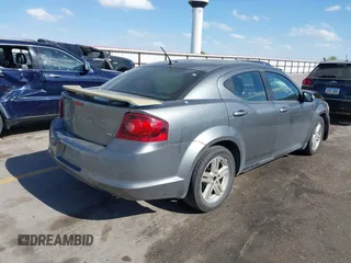 2013 Dodge Avenger SXT with VIN 1C3CDZCG5DN544909, listed as a IAAI auction lot 42274681 with 136,781 mi miles and . Bid and sale history available at DreamBid. Image 4.