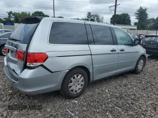 2010 Honda Odyssey LX with VIN 5FNRL3H2XAB059078, listed as a Copart auction lot 61144895 with 116,724 mi miles and Salvage title. Bid and sale history available at DreamBid. Image 3.