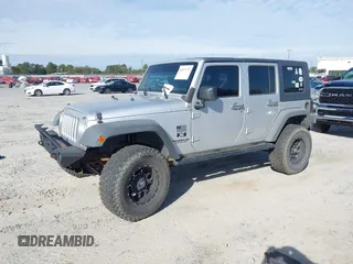 2007 Jeep Wrangler Unlimited X with VIN 1J4GB39147L199367, listed as a IAAI auction lot 40897772 with 229,309 mi miles and . Bid and sale history available at DreamBid. Image 17.