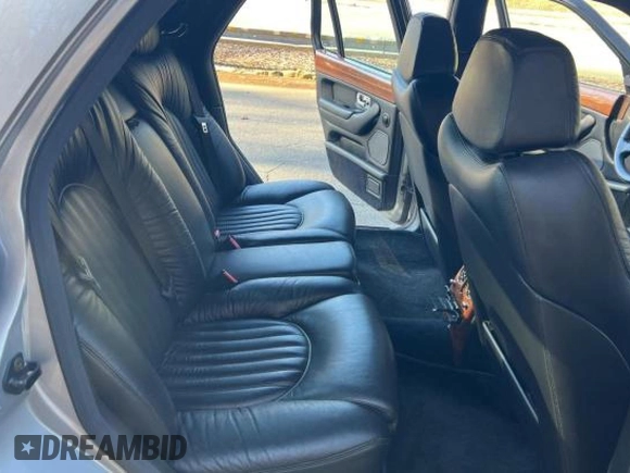 1999 Bentley Arnage with VIN SCBLB51E9XCX01954, listed as a Copart auction lot 46446125 with 81,913 mi miles and Clean Title. Bid and sale history available at DreamBid. Image 6.