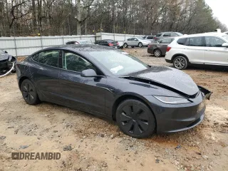 2024 Tesla Model 3 with VIN 5YJ3E1EA8RF755854, listed as a Copart auction lot 45986995 with 7,374 mi miles and Salvage Title. Bid and sale history available at DreamBid. Image 4.