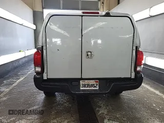 2019 Toyota Tacoma SR with VIN 5TFRX5GN1KX143485, listed as a IAAI auction lot 42763045 with 90,847 mi miles and . Bid and sale history available at DreamBid. Image 42.