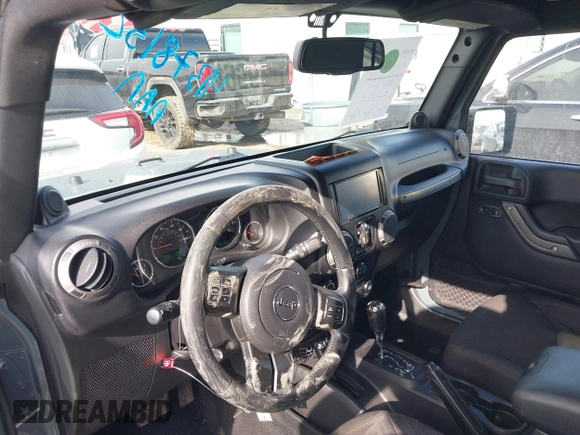 2014 Jeep Wrangler Unlimited Sport with VIN 1C4BJWDG9EL309763, listed as a IAAI auction lot 41378132 with 117,029 mi miles. Bid and sale history available at carsss.com. Image 18.