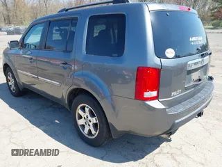 2011 Honda Pilot Touring with VIN 5FNYF4H94BB035415, listed as a IAAI auction lot 42126738 with 239,273 mi miles. Bid and sale history available at carsss.com. Image 3.