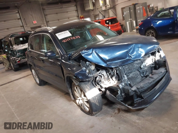 2011 Volkswagen Tiguan SE with VIN WVGBV7AXXBW533872, listed as a IAAI auction lot 40197835 with 104,685 mi miles and . Bid and sale history available at DreamBid. Image 1.