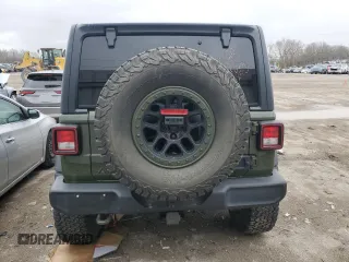 2021 Jeep Wrangler Unlimited Willys with VIN 1C4HJXDG2MW563201, listed as a Copart auction lot 50156305 with 33,372 mi miles and Salvage title. Bid and sale history available at DreamBid. Image 6.