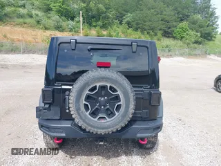 2017 Jeep Wrangler Unlimited Rubicon Recon z VIN 1C4HJWFG4HL507601, wystawiony jako IAAI lot #42258921 z przebiegiem 106 122 mil mil oraz . Historia ofert i sprzedaży dostępna na DreamBid. Obrazek 17.
