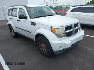 2011 Dodge Nitro SE z VIN 1D4PT2GK3BW590187, wystawiony jako IAAI lot #42264629 z przebiegiem 207 749 mil mil oraz . Historia ofert i sprzedaży dostępna na DreamBid. Obrazek 1.