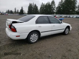 1996 Honda Accord LX with VIN 1HGCD5639TA158062, listed as a Copart auction lot 47434945 with 156,519 mi miles and Salvage Title. Bid and sale history available at DreamBid. Image 3.