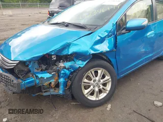 2010 Honda Insight EX z VIN JHMZE2H79AS011105, wystawiony jako IAAI lot #42346144 z przebiegiem 210 388 mil mil oraz . Historia ofert i sprzedaży dostępna na DreamBid. Obrazek 6.