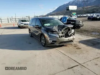 2018 Honda Odyssey Touring с VIN 5FNRL6H8XJB076145, выставлен на аукционе Copart как лот 51870865 с пробегом 96 486 миль миль и Списание • Salvage title. История ставок и продаж доступна на DreamBid. Изображение 12.