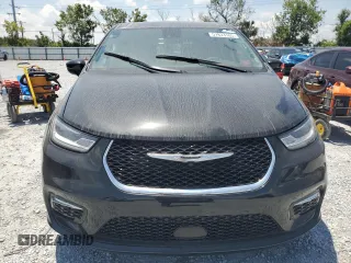 2023 Chrysler Pacifica Touring L с VIN 2C4RC1BG0PR606557, выставлен на аукционе Copart как лот 57833105 с пробегом 18 551 миль миль и Списание • Salvage title. История ставок и продаж доступна на DreamBid. Изображение 5.