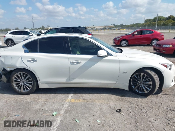 2020 Infiniti Q50 Luxe with VIN JN1EV7AP6LM201462, listed as a IAAI auction lot 42090939 with 50,633 mi miles and . Bid and sale history available at DreamBid. Image 14.