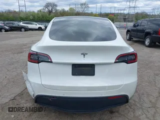 2022 Tesla Model Y Long Range z VIN 7SAYGDEE7NF385207, wystawiony jako IAAI lot #42054449 z przebiegiem 52 834 mil mil oraz . Historia ofert i sprzedaży dostępna na DreamBid. Obrazek 16.