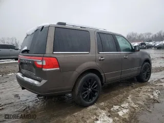 2015 Lincoln Navigator with VIN 5LMJJ2JT7FEJ14653, listed as a Copart auction lot 44921315 with 112,183 mi miles and Salvage Title. Bid and sale history available at carsss.com. Image 3.