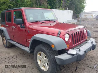 2013 Jeep Wrangler Unlimited Sport z VIN 1C4HJWDG7DL516077, wystawiony jako IAAI lot #42521985 z przebiegiem 169 299 mil mil oraz . Historia ofert i sprzedaży dostępna na DreamBid. Obrazek 1.