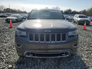 2015 Jeep Grand Cherokee Overland with VIN 1C4RJFCMXFC237723, listed as a Copart auction lot 50318145 with 103,741 mi miles and Salvage title. Bid and sale history available at DreamBid. Image 5.
