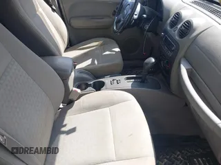2005 Jeep Liberty Sport with VIN 1J4GL48545W655788, listed as a IAAI auction lot 41914703 with 166,899 mi miles and . Bid and sale history available at carsss.com. Image 5.