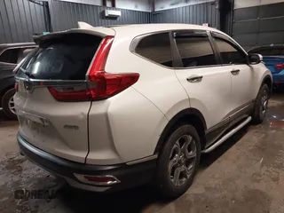 2019 Honda CR-V EX-L with VIN 2HKRW2H85KH607755, listed as a IAAI auction lot 40875501 with 56,756 mi miles. Bid and sale history available at carsss.com. Image 4.