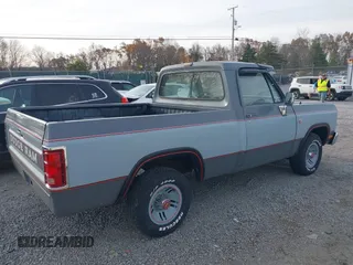 1988 Dodge D/W 100 with VIN 1B7FD04X9JS676023, listed as a IAAI auction lot 40746708 with 98,215 mi miles. Bid and sale history available at carsss.com. Image 4.