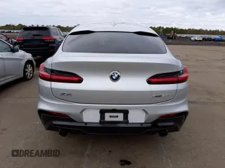 2021 BMW X4 xDrive30i z VIN 5UX2V1C06M9F10870, wystawiony jako Copart lot #37548973 z przebiegiem 13 840 mil mil oraz . Historia ofert i sprzedaży dostępna na DreamBid. Obrazek 6.