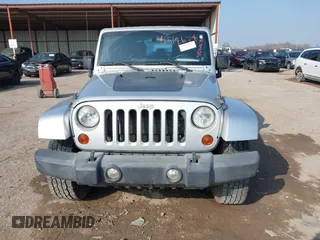 2012 Jeep Wrangler Unlimited Sahara with VIN 1C4HJWEG9CL146750, listed as a IAAI auction lot 41512678 with 94,952 mi miles. Bid and sale history available at carsss.com. Image 12.