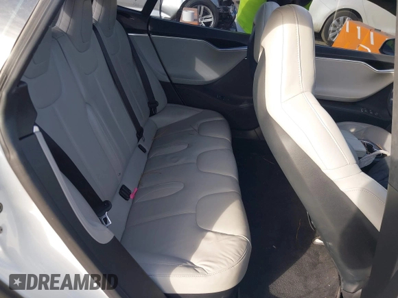 2016 Tesla Model S 90D with VIN 5YJSA1E21GF128460, listed as a IAAI auction lot 40733920 with 89,846 mi miles and . Bid and sale history available at DreamBid. Image 8.