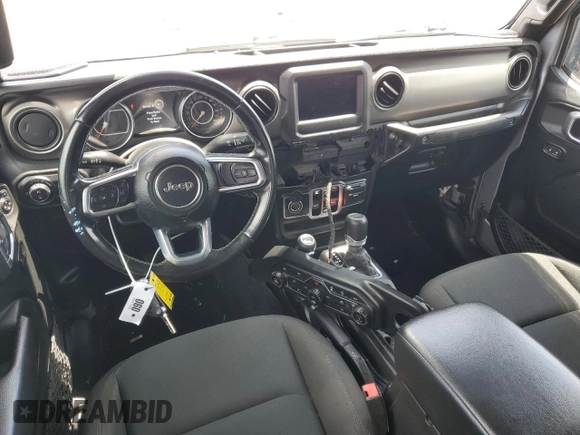 2020 Jeep Gladiator Sport S with VIN 1C6JJTAG9LL149872, listed as a Copart auction lot 58518095 with 118,910 mi miles and Salvage title. Bid and sale history available at DreamBid. Image 8.