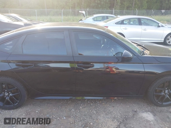 2022 Honda Civic Sport z VIN 2HGFE2F51NH570426, wystawiony jako IAAI lot #42289187 z przebiegiem 79 995 mil mil oraz . Historia ofert i sprzedaży dostępna na DreamBid. Obrazek 13.