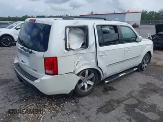 2012 Honda Pilot Touring with VIN 5FNYF3H9XCB035494, listed as a IAAI auction lot 42011362 with 271,887 mi miles and . Bid and sale history available at carsss.com. Image 4.