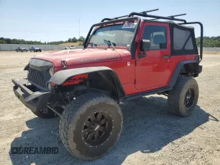 2014 Jeep Wrangler Rubicon with VIN 1C4BJWCG8EL210031, listed as a Copart auction lot 54390615 with 97,909 mi miles and Salvage title. Bid and sale history available at DreamBid. Image 1.