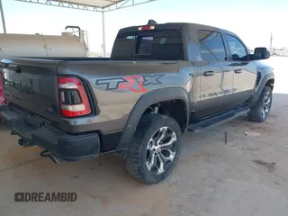2022 Ram 1500 TRX with VIN 1C6SRFU97NN353587, listed as a IAAI auction lot 42174702 with 35,305 mi miles and . Bid and sale history available at DreamBid. Image 4.