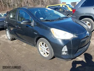 2013 Toyota Prius c One with VIN JTDKDTB36D1034076, listed as a IAAI auction lot 41622385 with 148,920 mi miles. Bid and sale history available at carsss.com. Image 1.