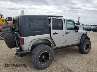 2011 Jeep Wrangler Unlimited Rubicon with VIN 1J4BA6H13BL537964, listed as a Copart auction lot 57532725 with 71,498 mi miles and Salvage title. Bid and sale history available at DreamBid. Image 3.