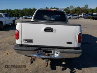 2002 Ford F-150 XLT with VIN 1FTRW07L42KB90527, listed as a Copart auction lot 85098244 with 143,213 mi miles and Salvage Title. Bid and sale history available at carsss.com. Image 6.