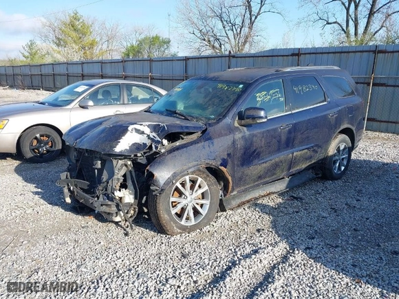 2014 Dodge Durango Limited with VIN 1C4RDJDG0EC428357, listed as a IAAI auction lot 41982340 with 62,910 mi miles. Bid and sale history available at carsss.com. Image 2.