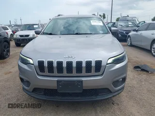 2021 Jeep Cherokee Altitude with VIN 1C4PJLLB2MD164004, listed as a IAAI auction lot 42083946 with 99,136 mi miles and . Bid and sale history available at DreamBid. Image 12.