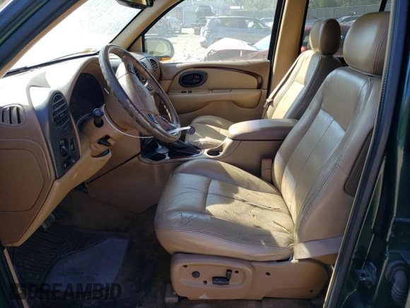 2002 Oldsmobile Bravada z VIN 1GHDT13S922398449, wystawiony jako Copart lot #71851603 z przebiegiem 145 963 mil mil oraz Nie do naprawy • Non repairable. Historia ofert i sprzedaży dostępna na DreamBid. Obrazek 7.